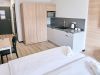 Double bed with kitchen
