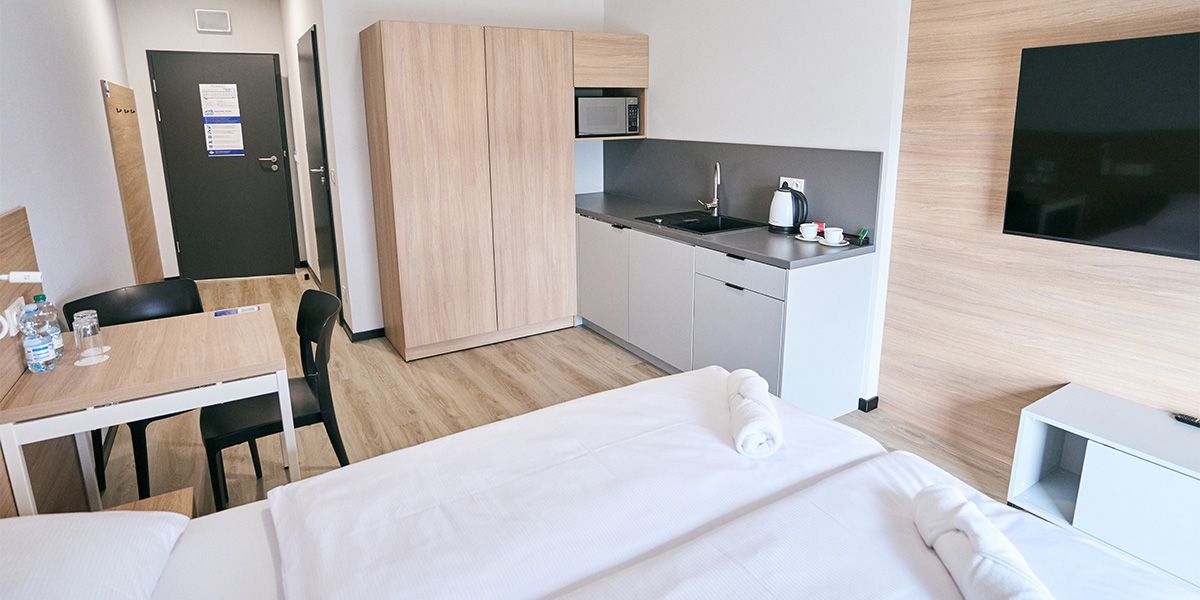 Double bed with kitchen